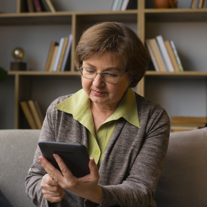 Woman reading on a tablet